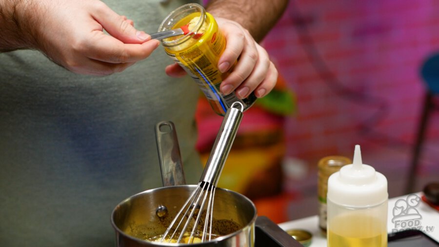 Adding chicken bouillon powder to the pot