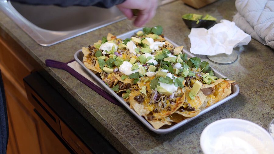 Completed Ultimate Nachos dish sits on countertop just waiting to be devoured. It looks so good!