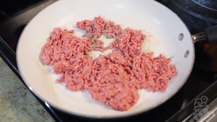 Ground beef is browned in non-stick skillet