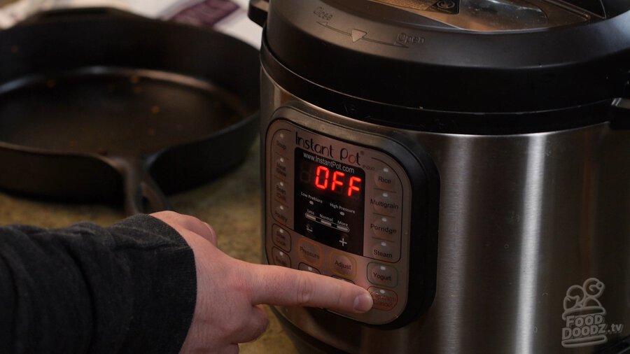 Pressing the keep warm/cancel button on Instant Pot of Vietnamese Pho