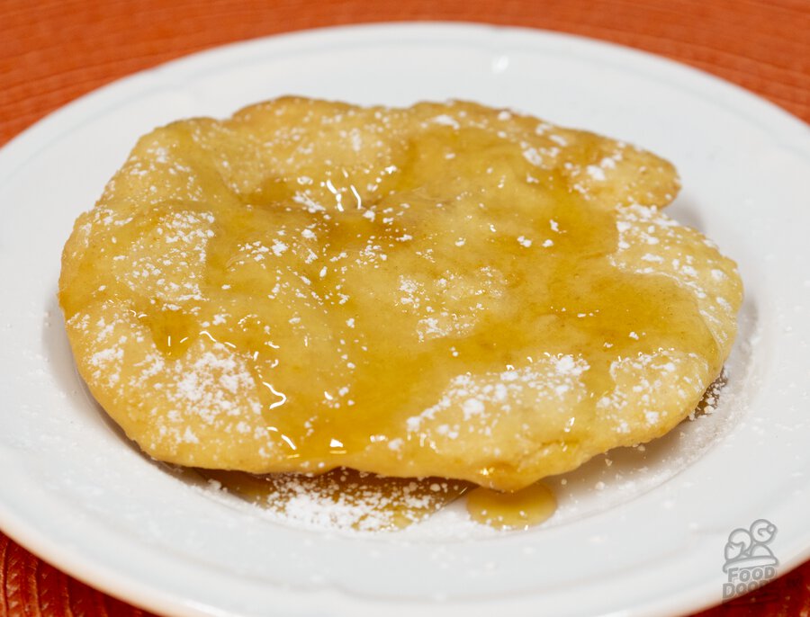 Indian (native american) fry bread topped with honey and powdered sugar!