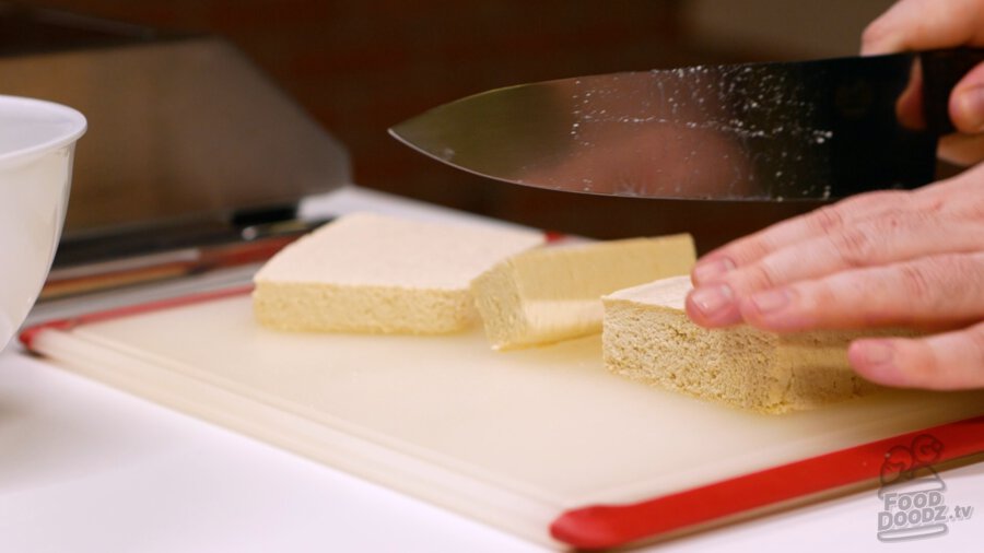 Cutting up tofu