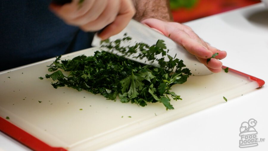 Finely chopping parsley