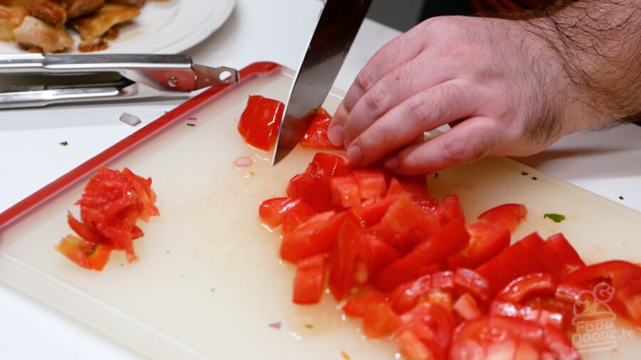 Cutting the tomato up