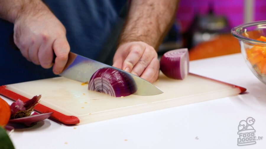 Roughly chopping up onion