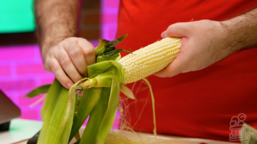 Shucking corn