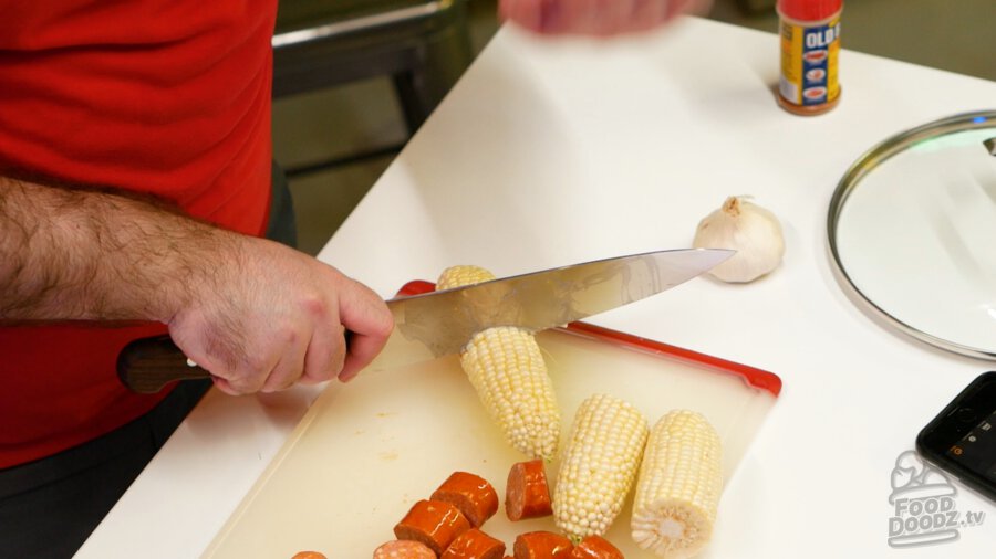 Cutting corn in half