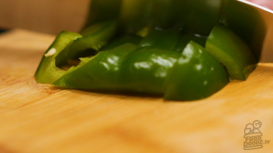 cutting up bell pepper