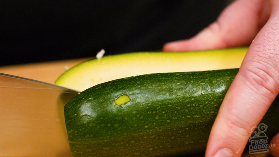 slicing zucchini lengthwise