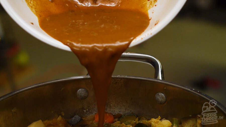 adding the dissolved curry roux to the pot