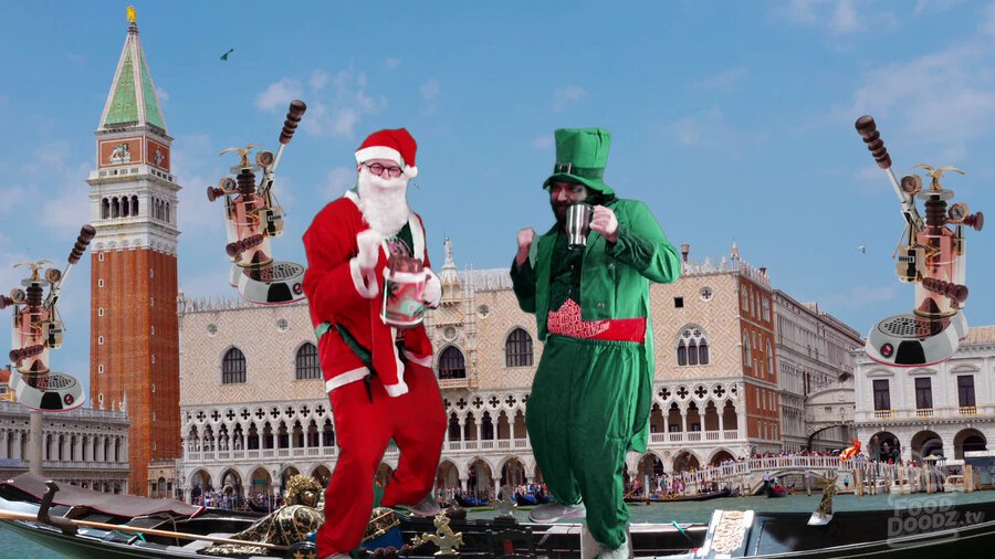 Austin dressed as Santa and Adam dressed as leprechaun standing on gondola in Venice pulling expresso shots with giant La Pavoni machines behind them